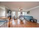Bright living area featuring hardwood floors, ceiling fan, and plenty of natural light at 3517 Claremont St, Mount Pleasant, SC 29466
