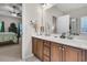 Spacious bathroom with double sink vanity and a view of the bedroom at 3537 Galaxy Rd, Ladson, SC 29456
