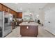 Bright kitchen featuring stainless steel appliances, granite countertops, and a large island, perfect for entertaining at 3537 Galaxy Rd, Ladson, SC 29456