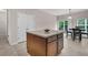 Kitchen island with granite countertop and ample cabinet storage space; view of breakfast nook at 3537 Galaxy Rd, Ladson, SC 29456