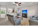 Comfortable living room with neutral tones, ceiling fan, and access to the kitchen at 3537 Galaxy Rd, Ladson, SC 29456