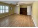 Bedroom featuring yellow walls, hardwood floors, a ceiling fan, and bright natural light through shuttered windows at 36 Forde Row, Charleston, SC 29412