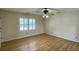 Bedroom featuring plantation shutters, ceiling fan and wood floors at 36 Forde Row, Charleston, SC 29412