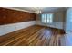 Dining room with traditional paneling and vibrant wallpaper at 36 Forde Row, Charleston, SC 29412