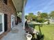 Inviting covered porch with classic columns offers a relaxing outdoor space at 36 Forde Row, Charleston, SC 29412
