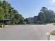 Street view of neighborhood with traditional-style homes and mature trees at 36 Forde Row, Charleston, SC 29412