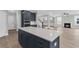 Kitchen island and views of living room with fireplace and stairway at 389 Wappoo Trace Ln, Summerville, SC 29486