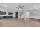 Open-concept living space connects the kitchen, living room, and stairway at 389 Wappoo Trace Ln, Summerville, SC 29486