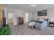 Bedroom with hardwood floors, large window, and natural light at 394 Flyway Rd, Goose Creek, SC 29445