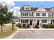 Charming townhome with a well-maintained lawn and parking in front at 394 Flyway Rd, Goose Creek, SC 29445