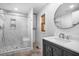 Bright bathroom featuring marble tiled shower, modern vanity and neutral colors at 398 W Fisher Rd, Summerville, SC 29483