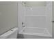 White bathroom featuring a new tub and shower combo with modern fixtures at 4013 A Ladson Rd, Ladson, SC 29456