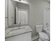 Bathroom featuring granite countertop, white cabinets and new fixtures at 4013 A Ladson Rd, Ladson, SC 29456