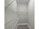 Walk-in closet with vinyl flooring and installed wire shelving for optimal storage at 4013 A Ladson Rd, Ladson, SC 29456