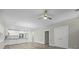 Living room with wood ceiling fan flowing into the kitchen area and storage at 4013 A Ladson Rd, Ladson, SC 29456