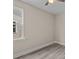 Bedroom with a window providing natural light and wood-look floors at 4013 B Ladson Rd, Ladson, SC 29456