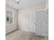 Bright bedroom with ceiling fan, a window and doors providing ample access and light at 4013 B Ladson Rd, Ladson, SC 29456