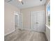 Bright bedroom with double closet doors and a view to a bathroom at 4013 B Ladson Rd, Ladson, SC 29456