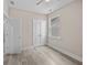 Bedroom with double closet, window, and neutral color scheme at 4013 B Ladson Rd, Ladson, SC 29456