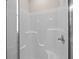 Inside a well-lit glass enclosed shower featuring smooth white shower walls and silver fixtures at 4013 B Ladson Rd, Ladson, SC 29456