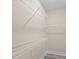 This spacious walk-in closet features white metal shelving along the walls and stylish light gray floors at 4013 B Ladson Rd, Ladson, SC 29456