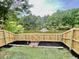 Fenced backyard overlooking a scenic lake and fountain for a peaceful outdoor space at 4114 Babbitt St, Charleston, SC 29414