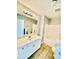 Well-lit bathroom with a single vanity and a shower-tub combo at 4114 Babbitt St, Charleston, SC 29414