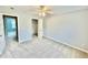 Spacious bedroom with neutral walls, carpet, and a ceiling fan at 4114 Babbitt St, Charleston, SC 29414