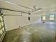 Large garage with ample space for vehicles and storage, featuring bright lighting at 4114 Babbitt St, Charleston, SC 29414