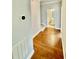 Hallway with hardwood floors leading to bathroom at 4114 Babbitt St, Charleston, SC 29414