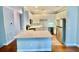 Modern kitchen featuring white cabinets, stainless appliances, and ample counter space at 4114 Babbitt St, Charleston, SC 29414