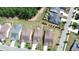 Aerial view of neighborhood with manicured lawns, tree lined streets, and well-maintained homes at 423 Four Seasons Blvd, Summerville, SC 29486