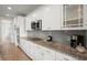 Modern kitchen featuring stainless steel appliances, granite countertops, and white cabinetry at 423 Four Seasons Blvd, Summerville, SC 29486