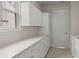 Bright laundry room featuring ample counter space and storage cabinets at 423 Four Seasons Blvd, Summerville, SC 29486