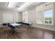 Well-lit meeting room with wood floors, many windows, and plenty of seating available at 423 Four Seasons Blvd, Summerville, SC 29486
