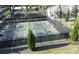 A great aerial view of pickleball courts where people are actively playing on a sunny day at 423 Four Seasons Blvd, Summerville, SC 29486