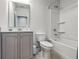 Clean bathroom featuring a vanity, toilet, and shower-tub combination at 431 Canal Crossing Way, Huger, SC 29450