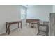 Spacious bedroom with versatile furniture, including piano, tables, and chairs at 431 Canal Crossing Way, Huger, SC 29450