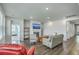 Inviting living room with fireplace, hardwood floors, and comfortable seating at 431 Canal Crossing Way, Huger, SC 29450