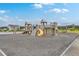 Outdoor wooden playground equipment featuring a slide and climbing wall offers a recreational space at 431 Canal Crossing Way, Huger, SC 29450