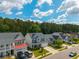 Aerial view of the neighborhood featuring well-maintained homes and lush trees at 435 Foxbank Plantation Blvd Blvd, Moncks Corner, SC 29461