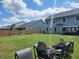 Expansive backyard with patio furniture and privacy fence at 435 Foxbank Plantation Blvd Blvd, Moncks Corner, SC 29461