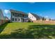 Spacious backyard featuring a well-maintained lawn and privacy fence at 435 Foxbank Plantation Blvd Blvd, Moncks Corner, SC 29461