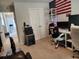 Bedroom with white computer desk and chair and American flag hung on the wall at 435 Foxbank Plantation Blvd Blvd, Moncks Corner, SC 29461