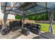 Covered gazebo area with comfortable seating and grill, ideal for outdoor entertaining at 435 Foxbank Plantation Blvd Blvd, Moncks Corner, SC 29461