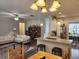 Open-concept kitchen and living area with granite countertops and stainless steel appliances at 435 Foxbank Plantation Blvd Blvd, Moncks Corner, SC 29461