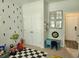 Playroom with checkered rug, table, and toys at 435 Foxbank Plantation Blvd Blvd, Moncks Corner, SC 29461