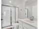 Modern bathroom with a glass-enclosed shower and stylish vanity with chrome fixtures at 435 Woodgate Way, Summerville, SC 29485