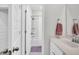 Clean bathroom with a tub shower, white tile, and a modern vanity with a towel rack at 435 Woodgate Way, Summerville, SC 29485
