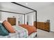 Bedroom featuring a bed with black frame, cozy linens, and and dressers at 435 Woodgate Way, Summerville, SC 29485